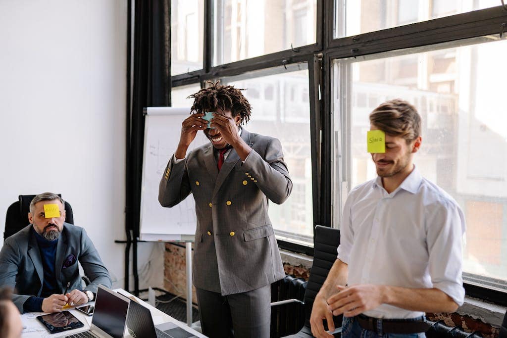Office Workers Playing Blind Man Bluff