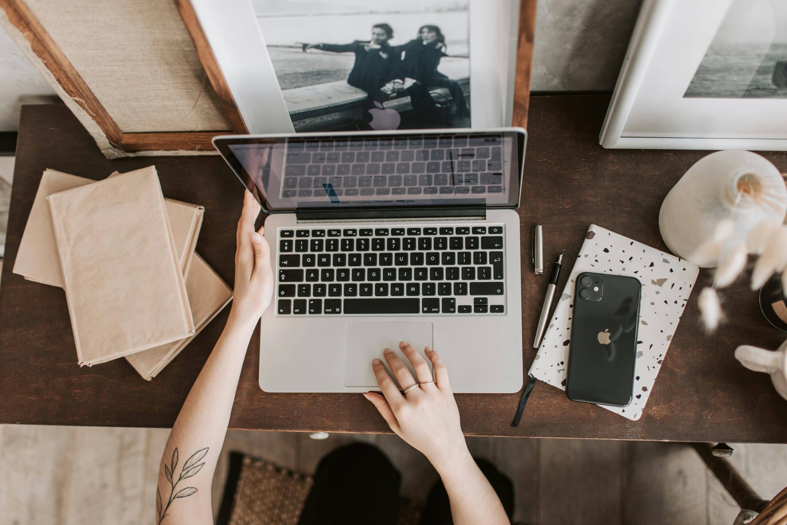 person using laptop at a desk